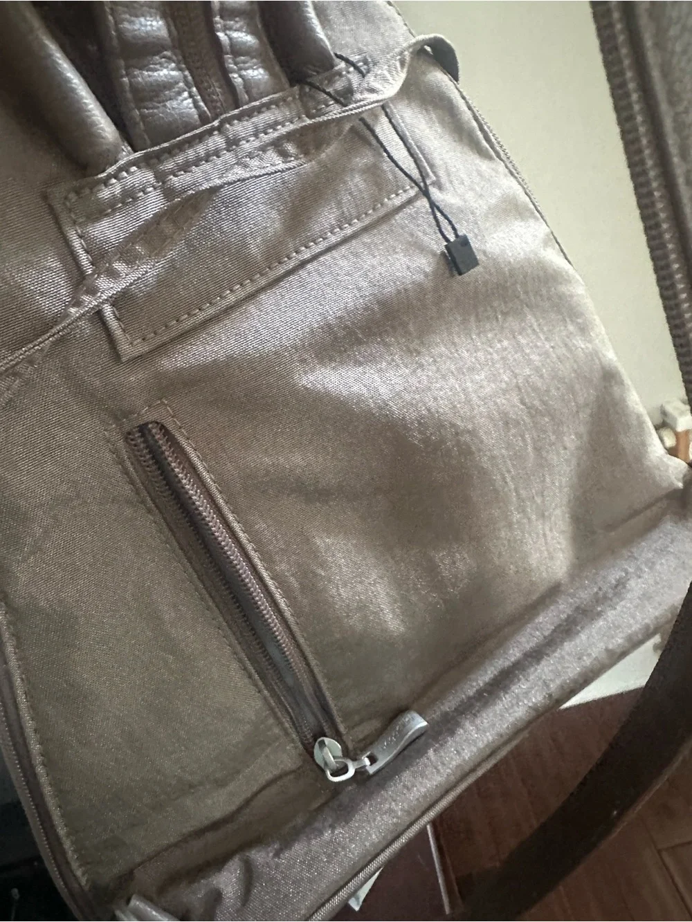 Baggallini Taupe Sling Backpack with Front Zip Pocket travel bag